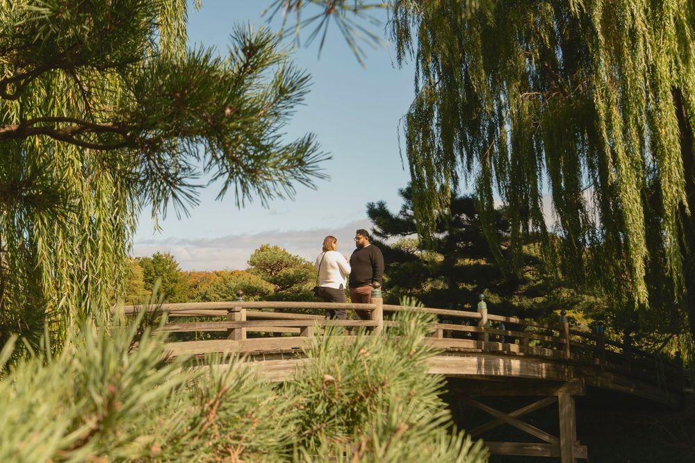 outdoor surprise proposal photoshoot in chicago IL at chicago botanical garden.