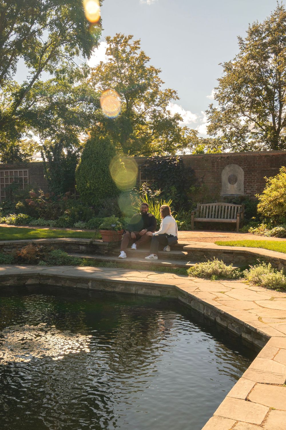outdoor surprise proposal photoshoot in chicago IL at chicago botanical garden.