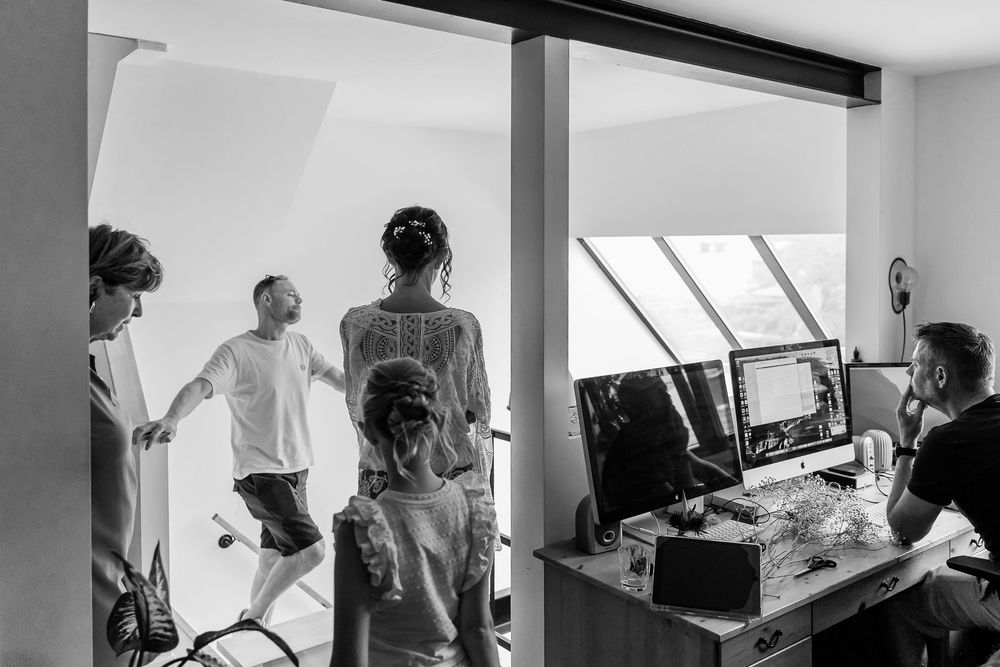 A series of black and white photographs showing musicians performing and practicing in a studio setting.