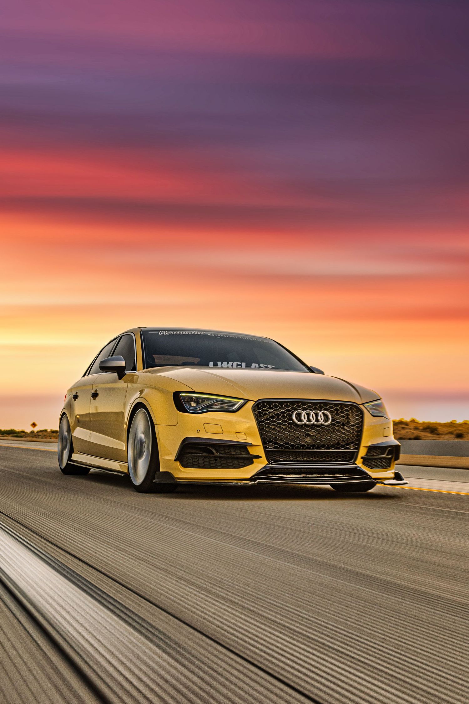 audi cruising into sunset