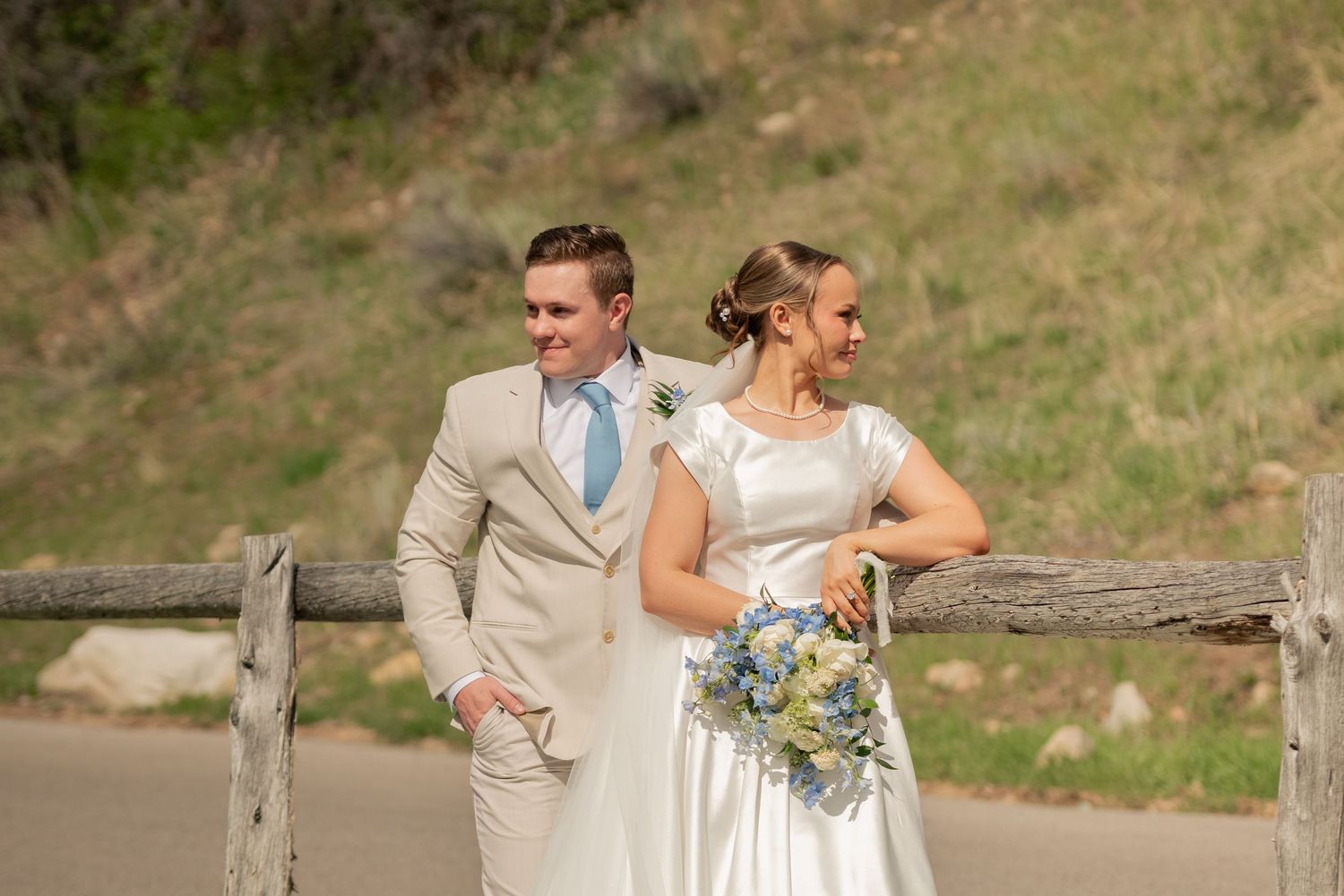 A stunning luxury wedding photo in the provo Utah canyons. Warm colors and modern posing with a stunning bridal couple.