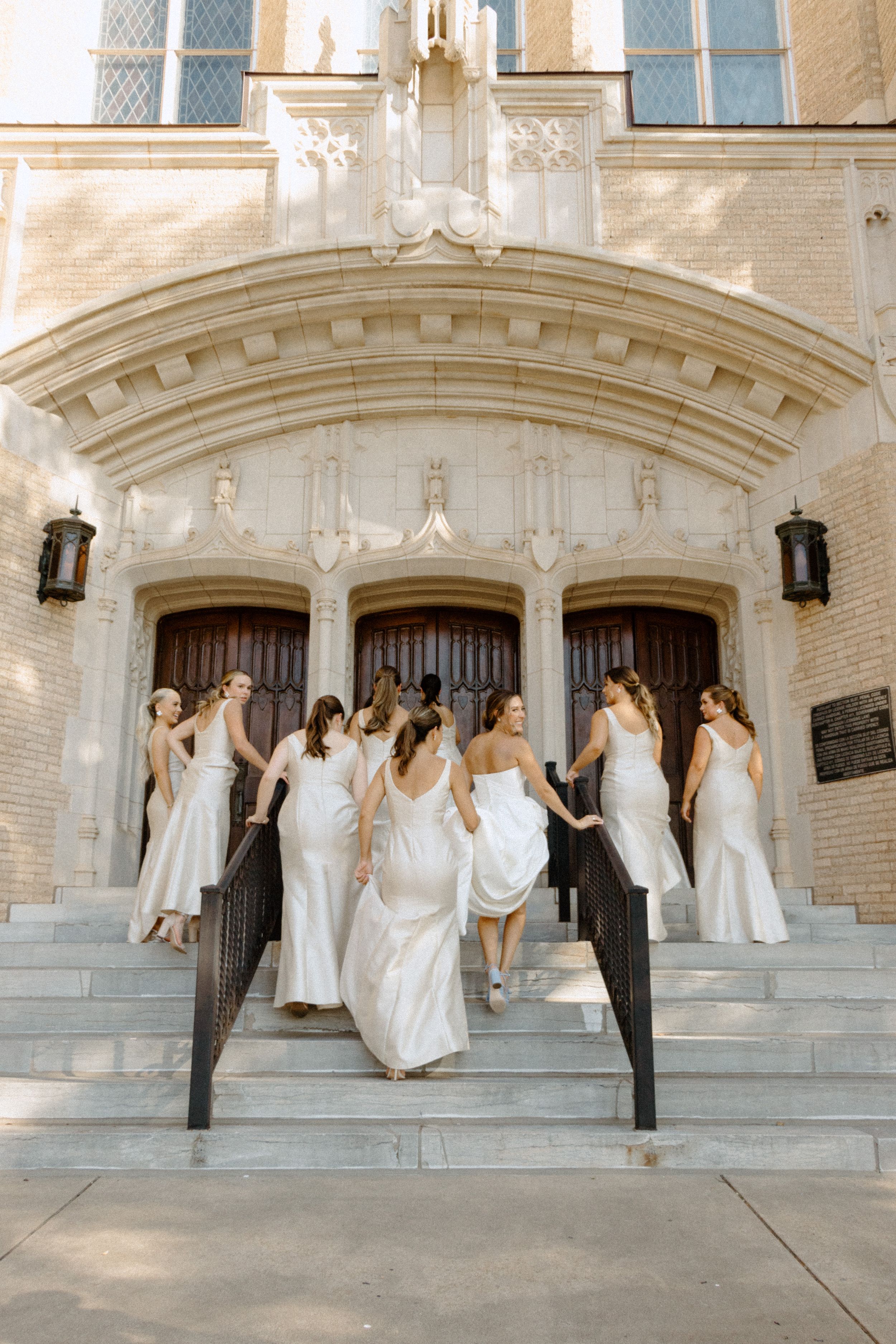 Bridesmaids entering church at Wichita Falls wedding, classic emotional storytelling photography.