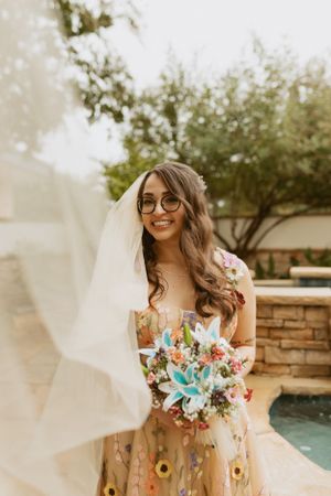 Smiling fairytale bride in flower dress Fort Worth wedding, dreamy ethereal portrait photography.