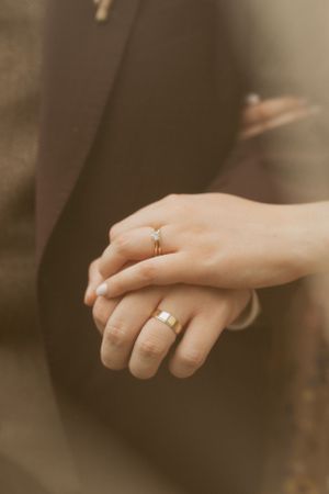 Close-up wedding rings photo, colorful dreamy Fort Worth wedding, emotional romantic storytelling.