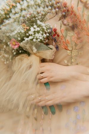 Dreamy fractal wedding ring photo against colorful flower bouquet and fairytale blush gown, Fort Worth TX wedding.