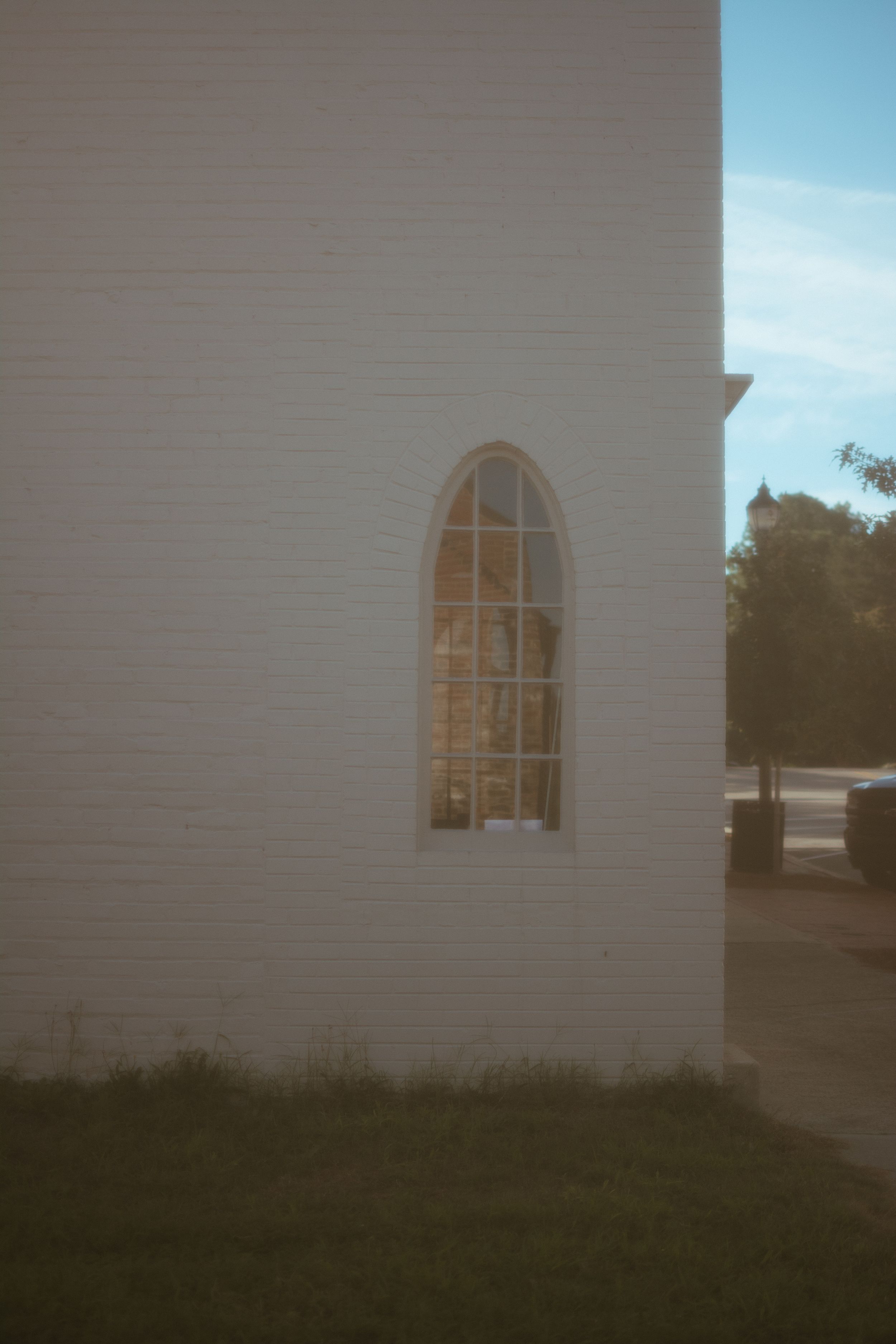 arched window of a brick building
