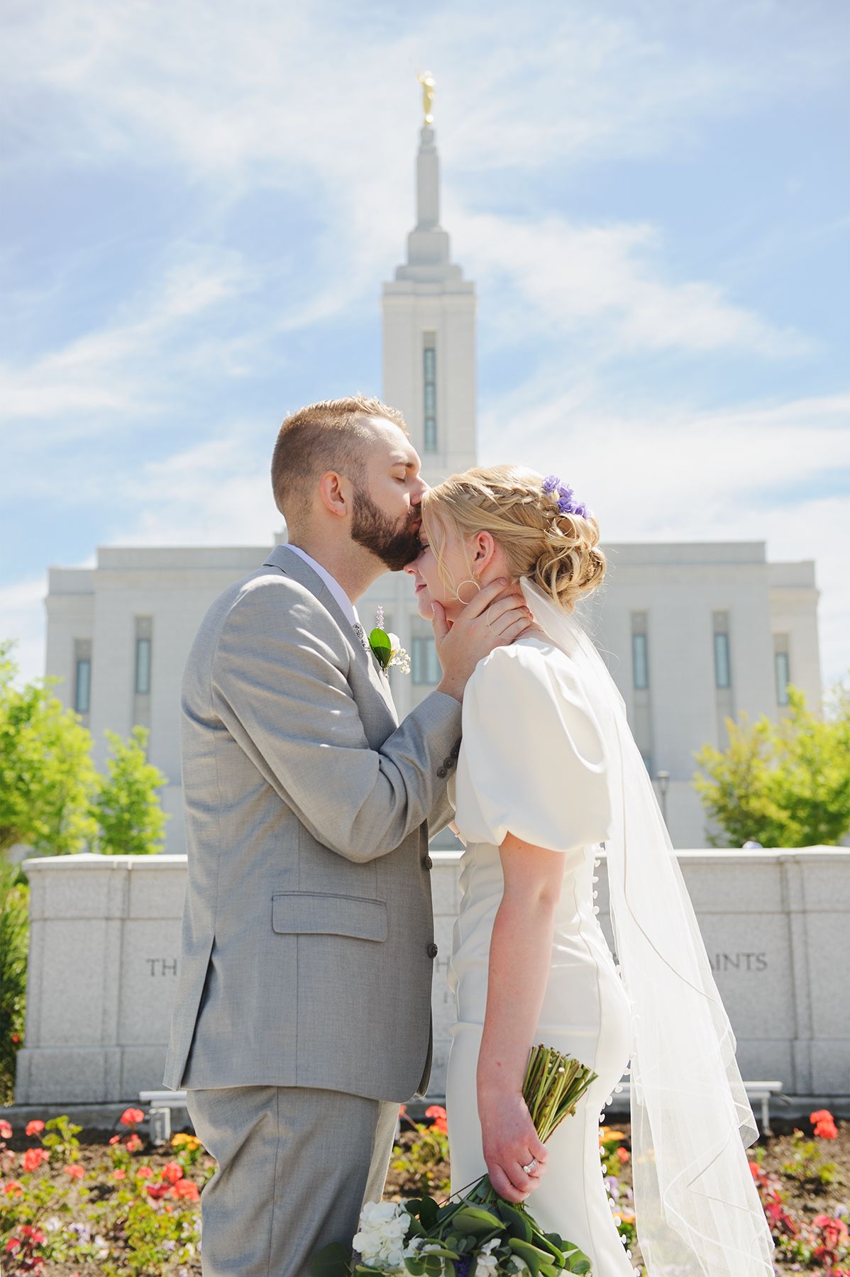 Blackfoot wedding photographer ShutterGirl  bride and groom in front of Pocatello Idaho temple