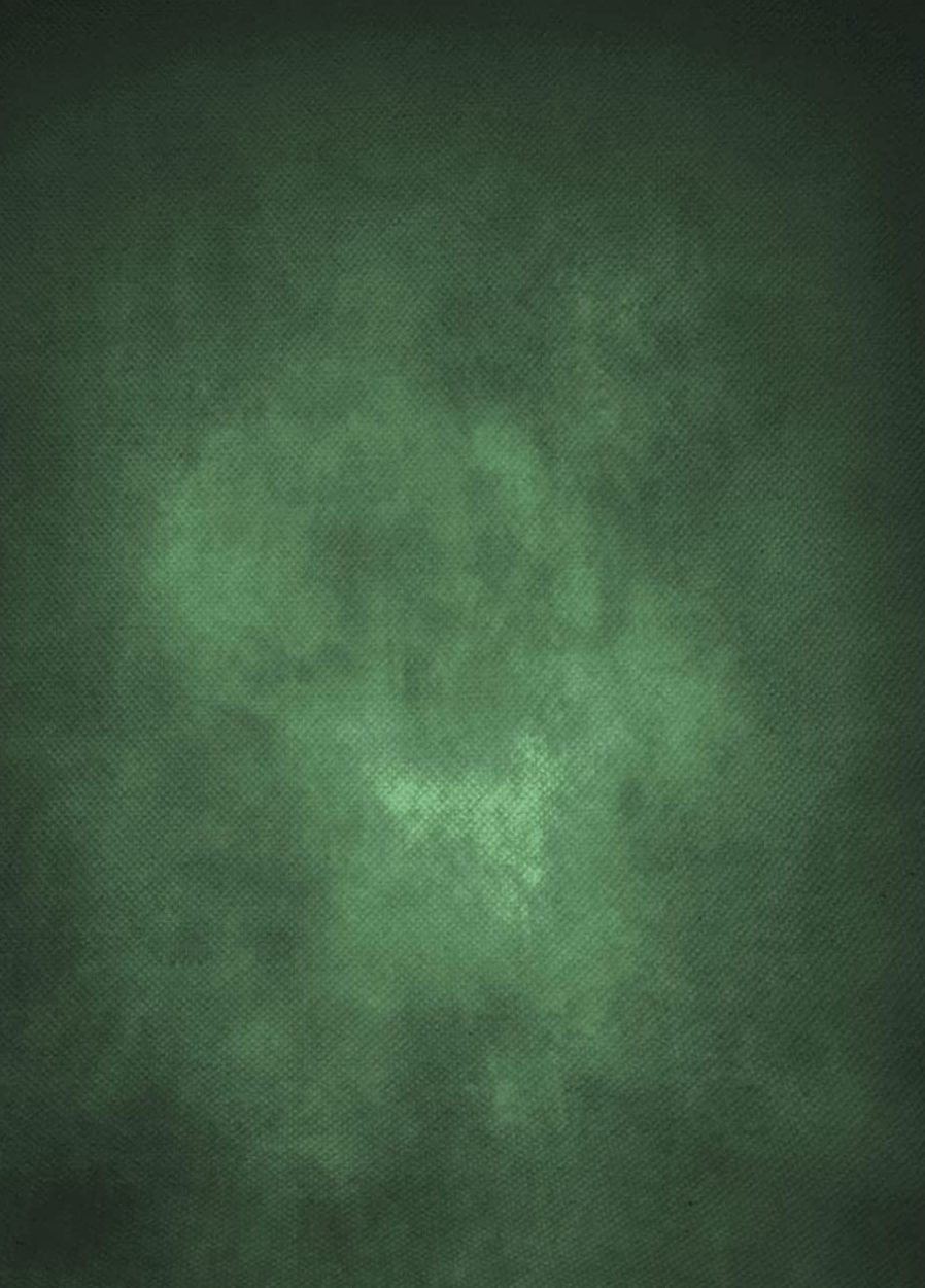 Forest green mottled background with subtle light center and dark vignette edges.