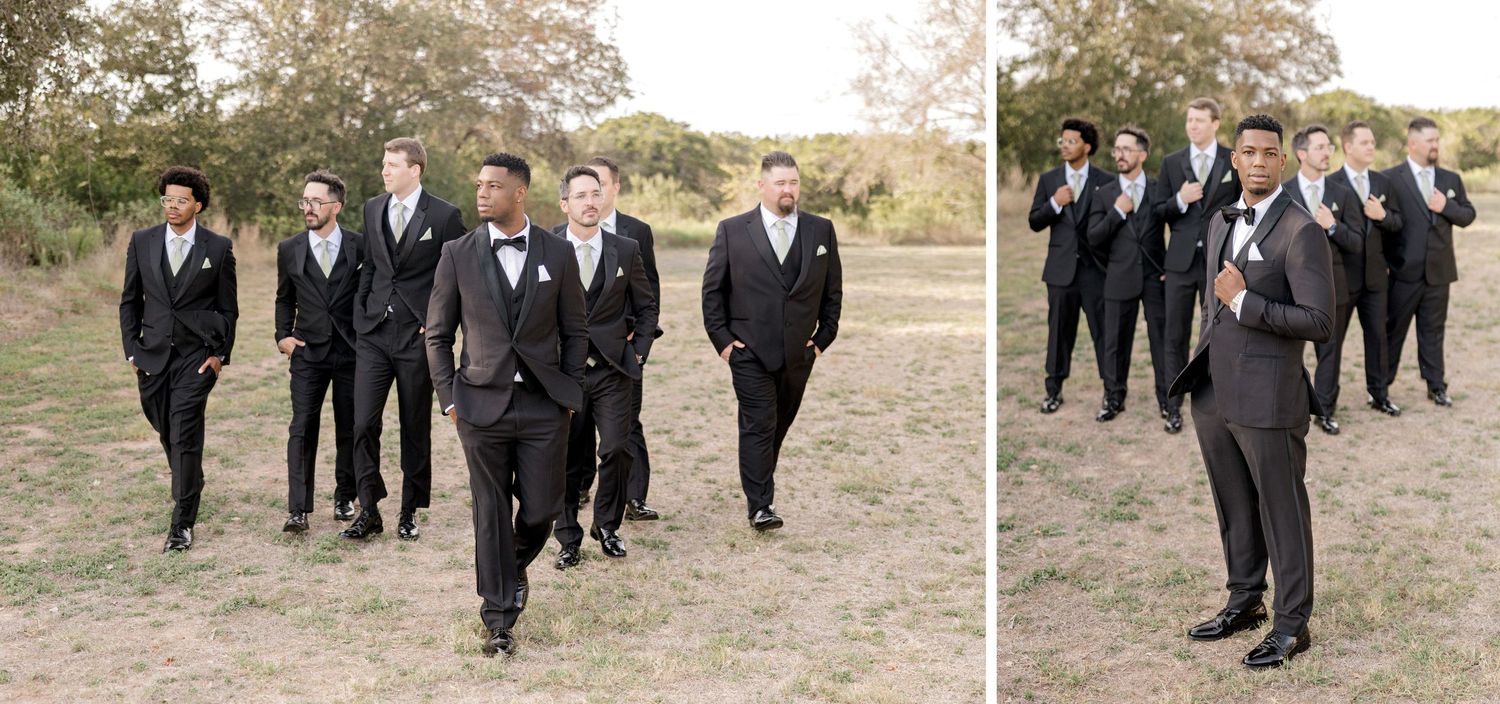 Groomsmen walking and posing casually in dark suits outdoors.