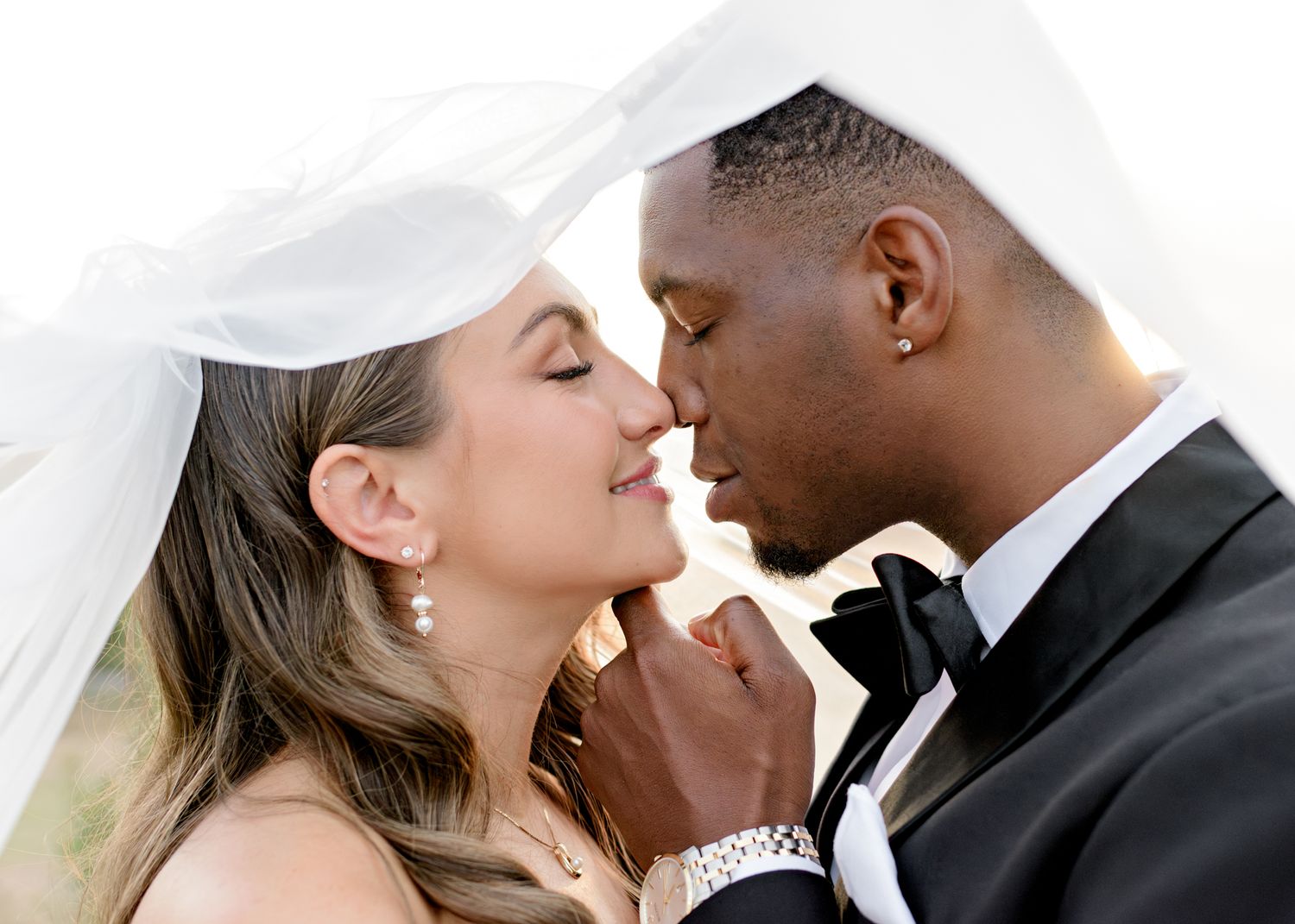 Romantic newlyweds share an intimate moment on their wedding day.