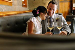 wedding couple enjoying wine