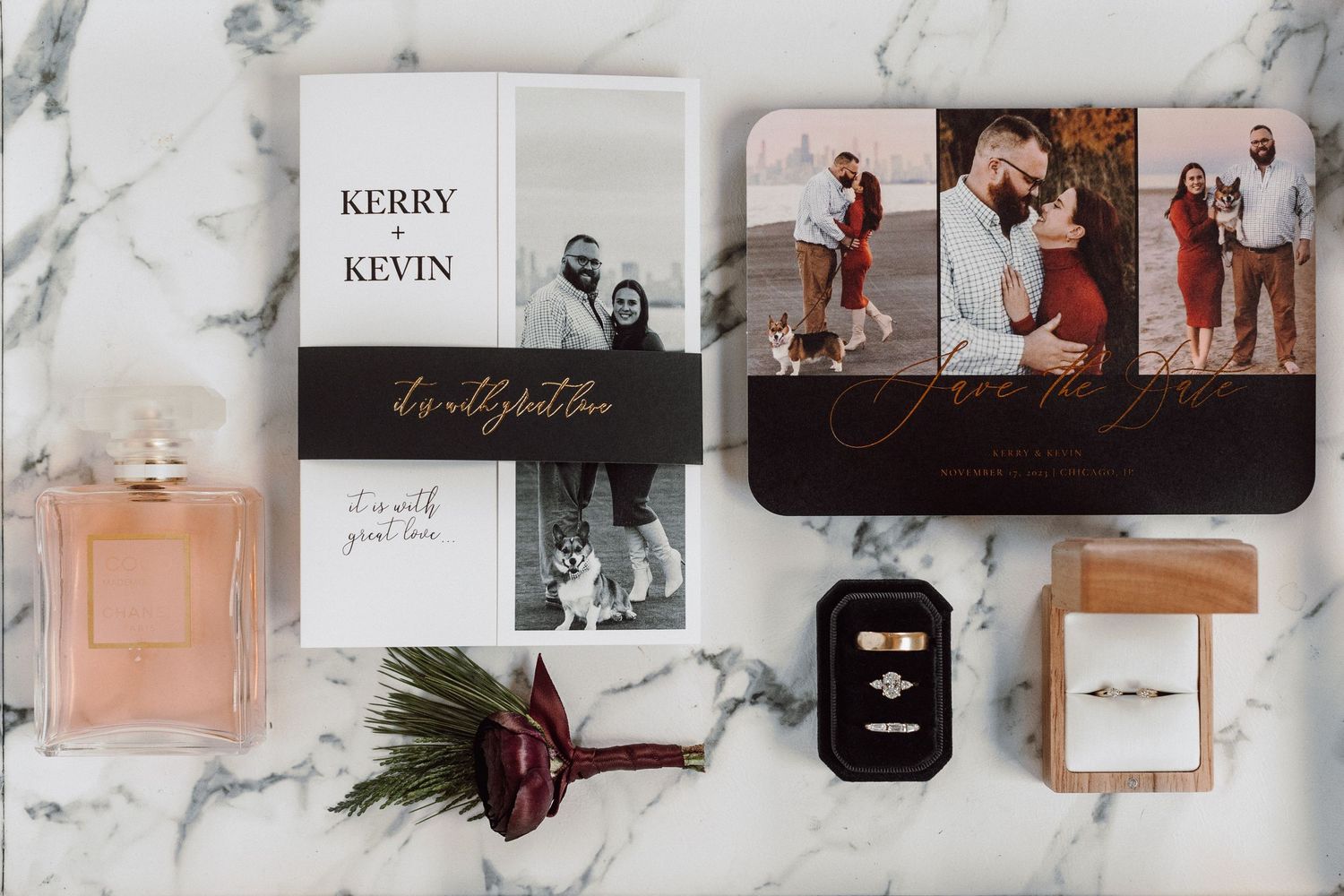 Wedding detail flatlay with marble background featuring photos, name cards, and perfume bottles.