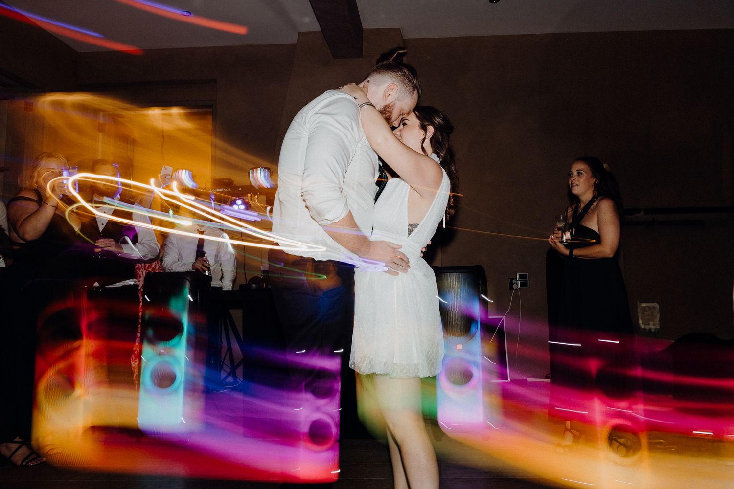 The bride and groom during their First Dance, captured by Apertured Media Auckland Wedding Photographer.