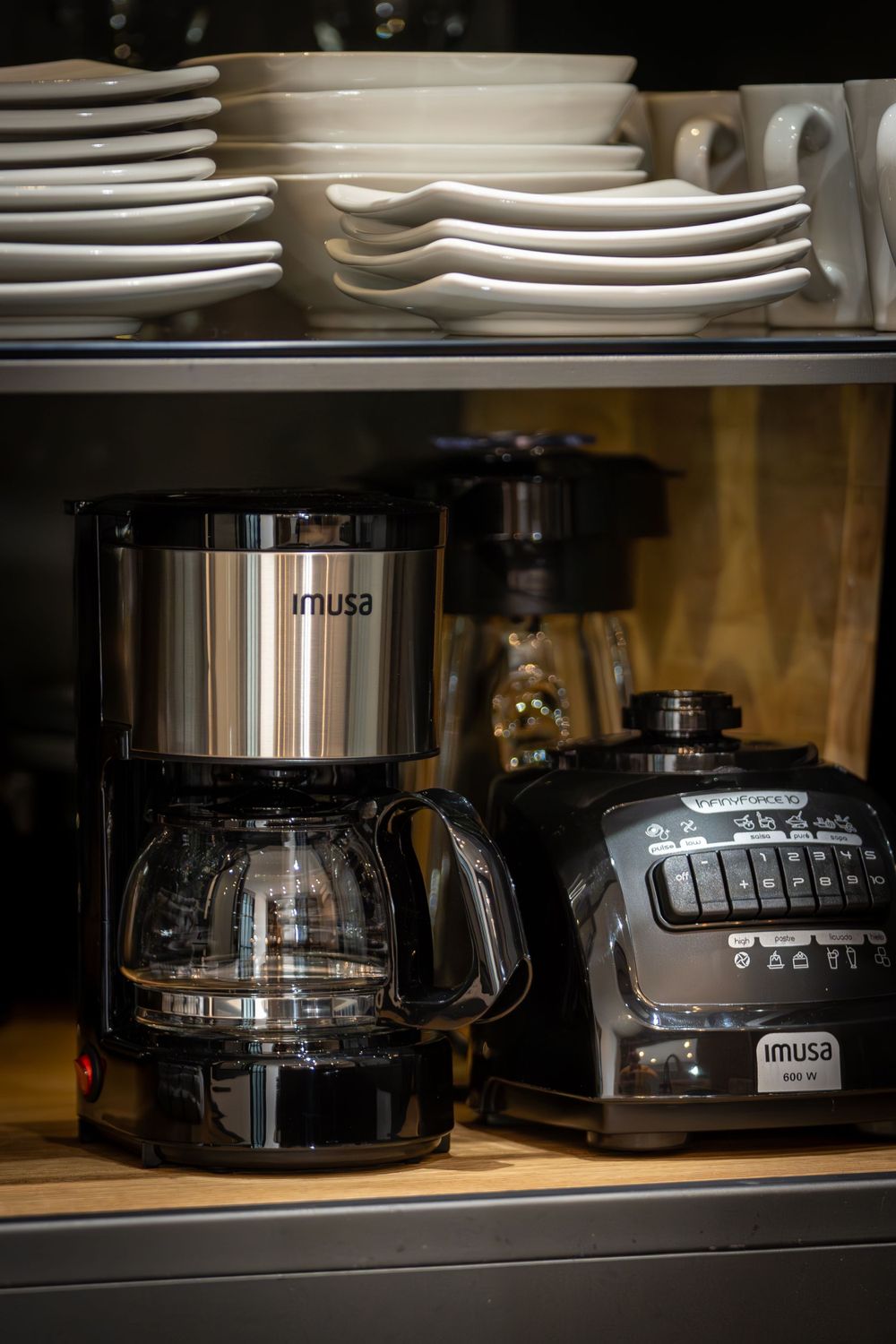 Sleek kitchen appliances in Medellin Airbnb, captured by Andrew Shainker Photography to showcase modern, high-end features.