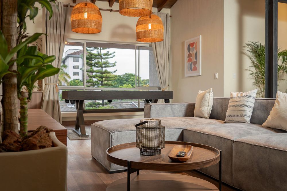 Stylish modern living room near Parque Poblado, expertly photographed by Andrew Shainker for stunning property visuals.