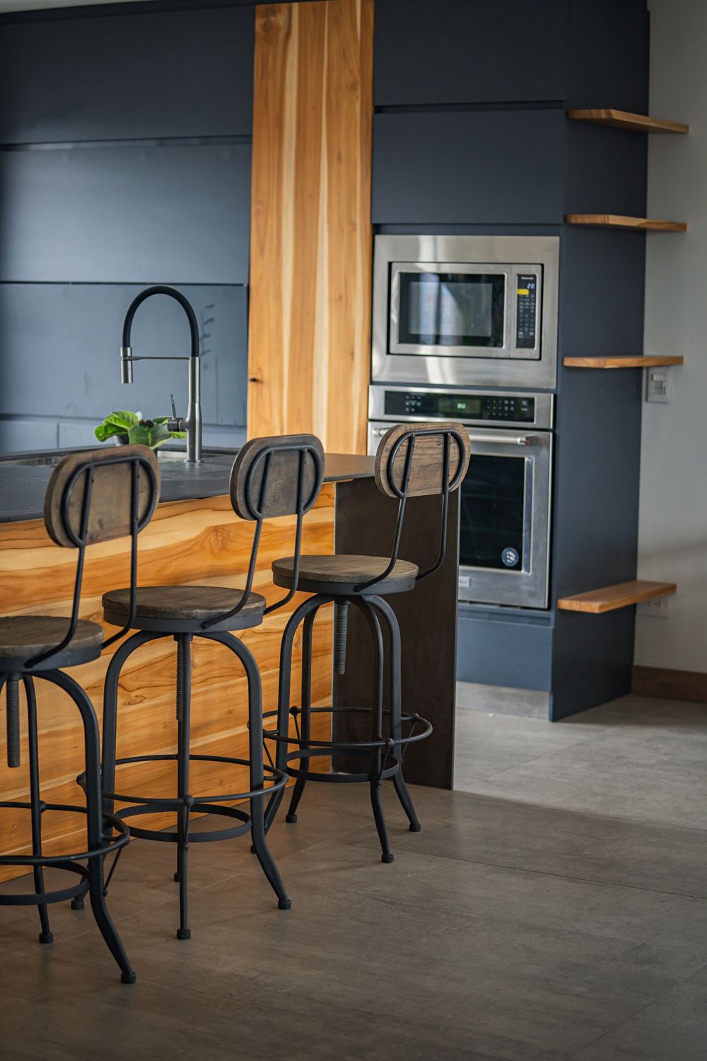 Modern kitchen in Poblado Medellin Airbnb with sleek design, high-end appliances, and ample space.
