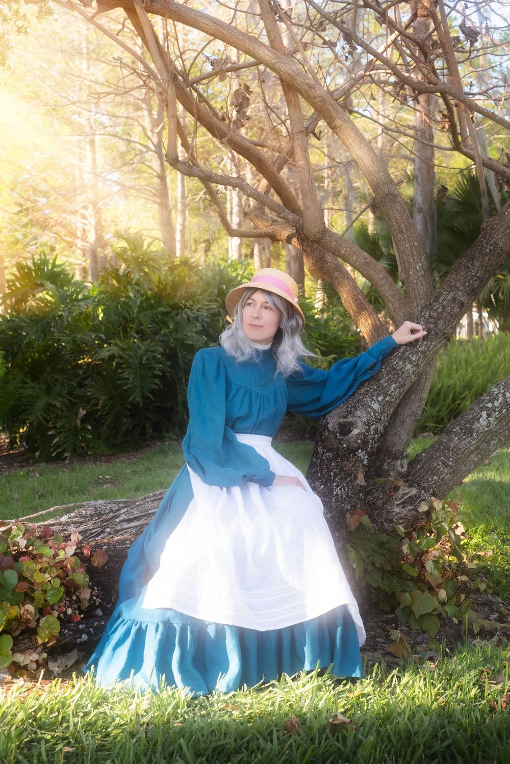 Cosplay photo of Sophie Hatter from Howl's Moving Castle posing in cinematic lighting