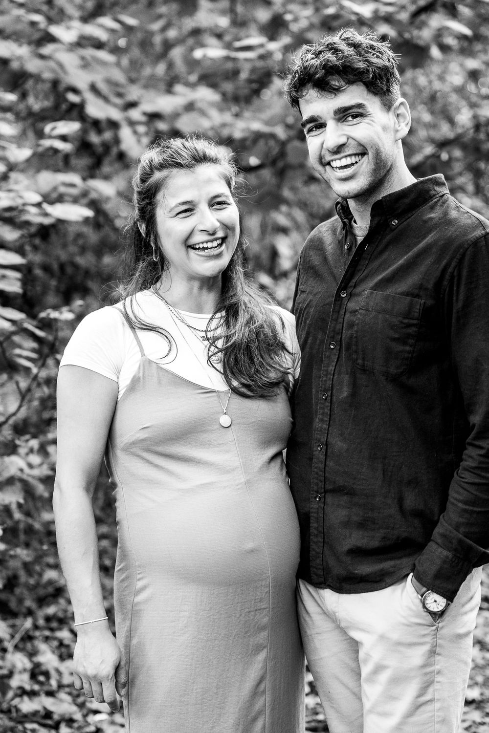a couple of smiling to the camera
