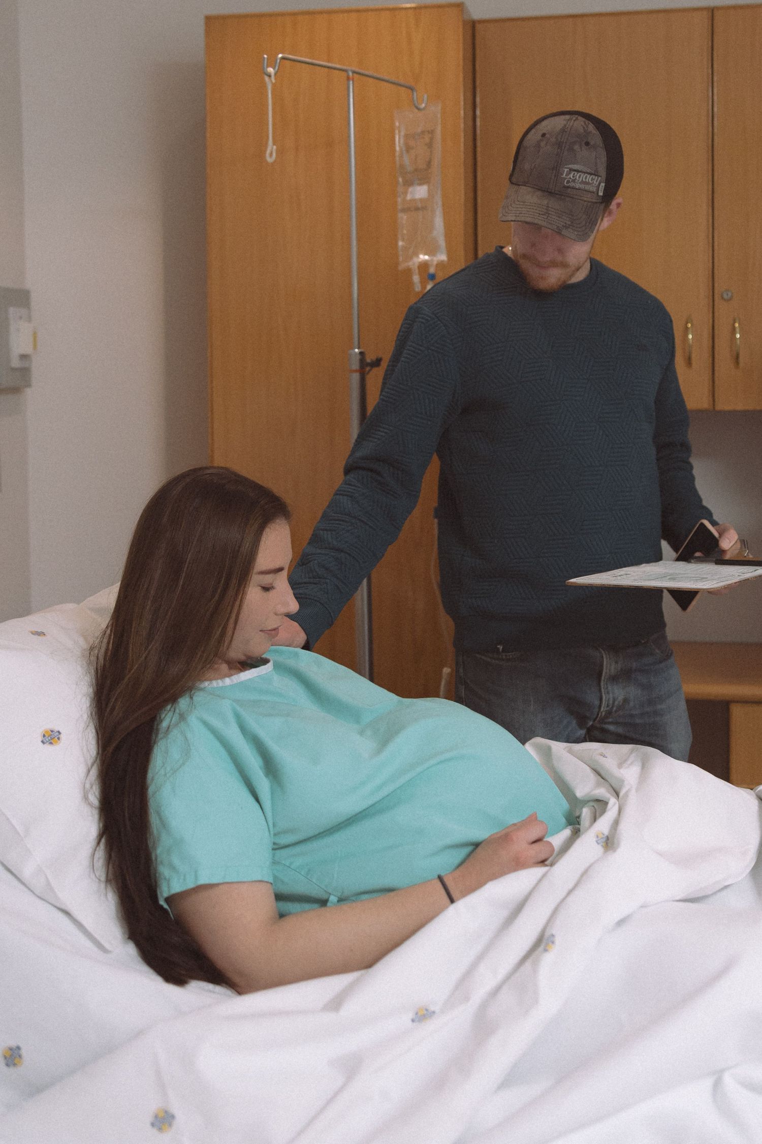 A sequence of medical photos shows a patient resting in a hospital bed while being monitored by medical staff.