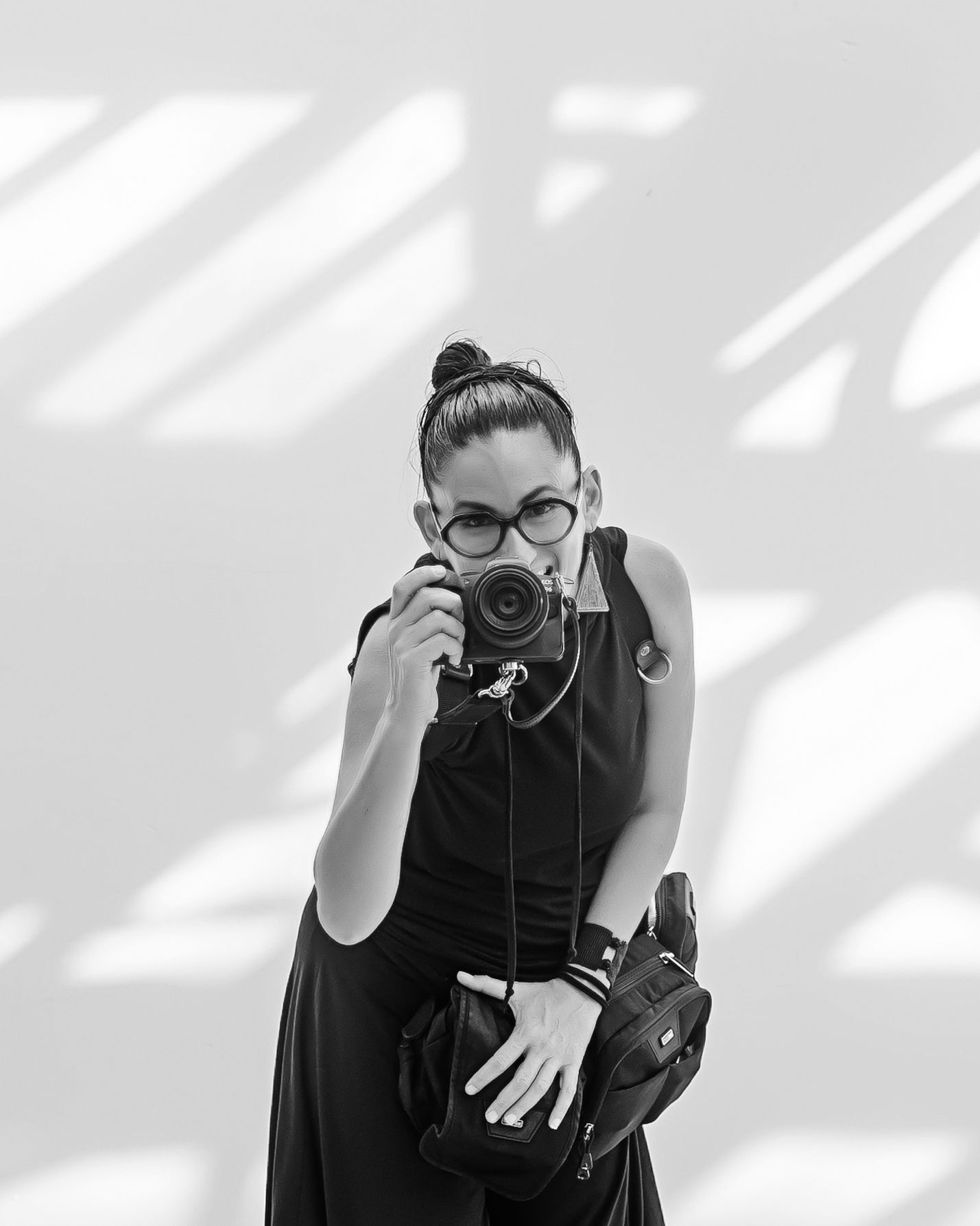 Ches Pizzini, founder of Quetzal Wedding Photo, capturing the essence of love and storytelling through her lens.