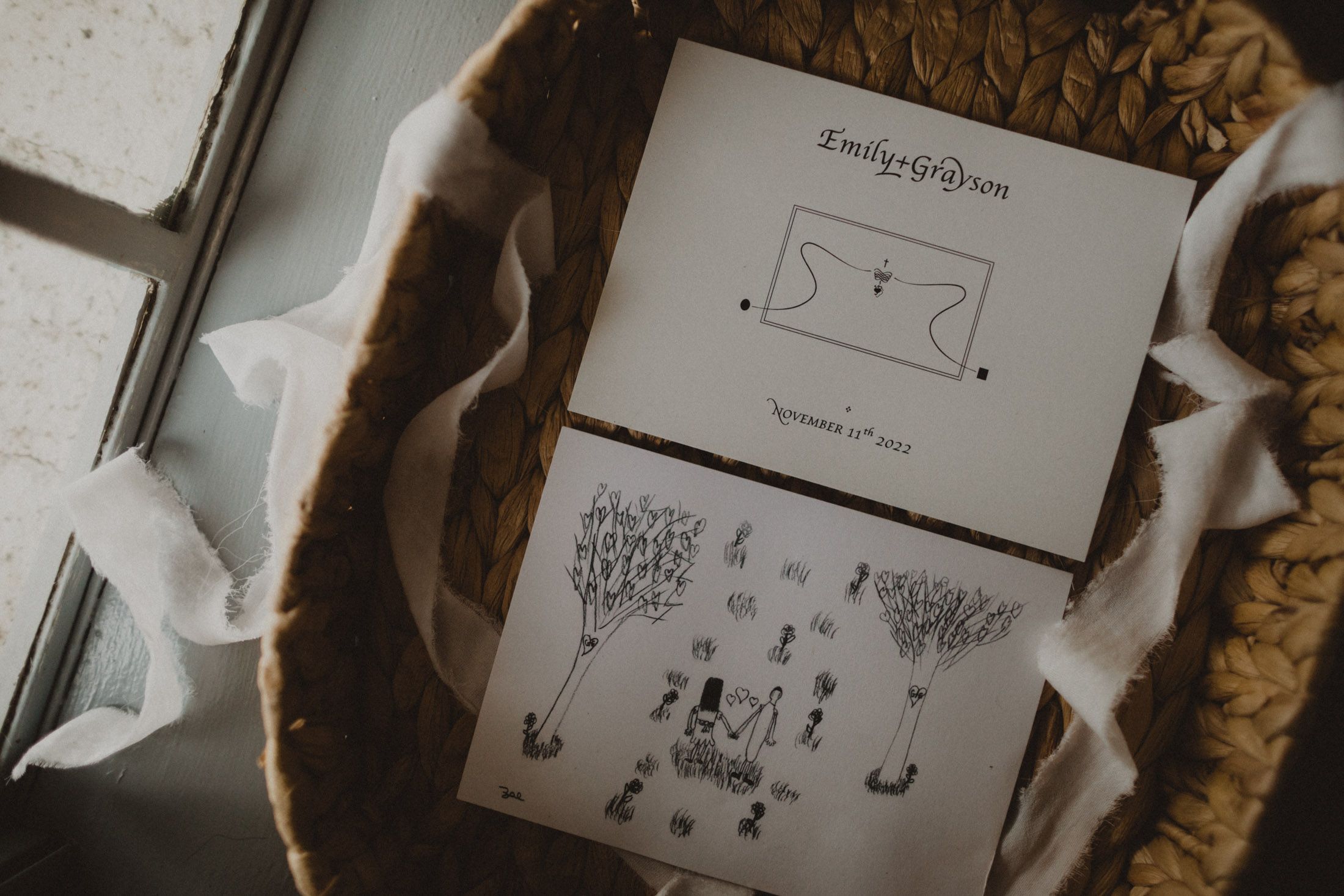 A collection of black and white sketches and drawings arranged in a row showing various artistic concepts and designs.