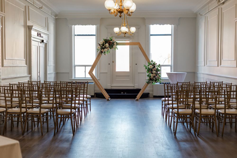 Wedding ceremony set up in the oak lobby at The Walper Hotel in Kitchener, Ontario.