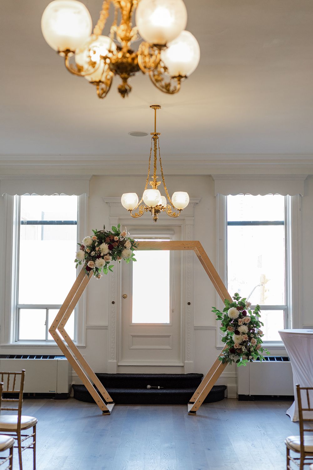 Close up of the geometric wedding arch for the ceremony at The Walper Hotel in Kitchener, Ontario.