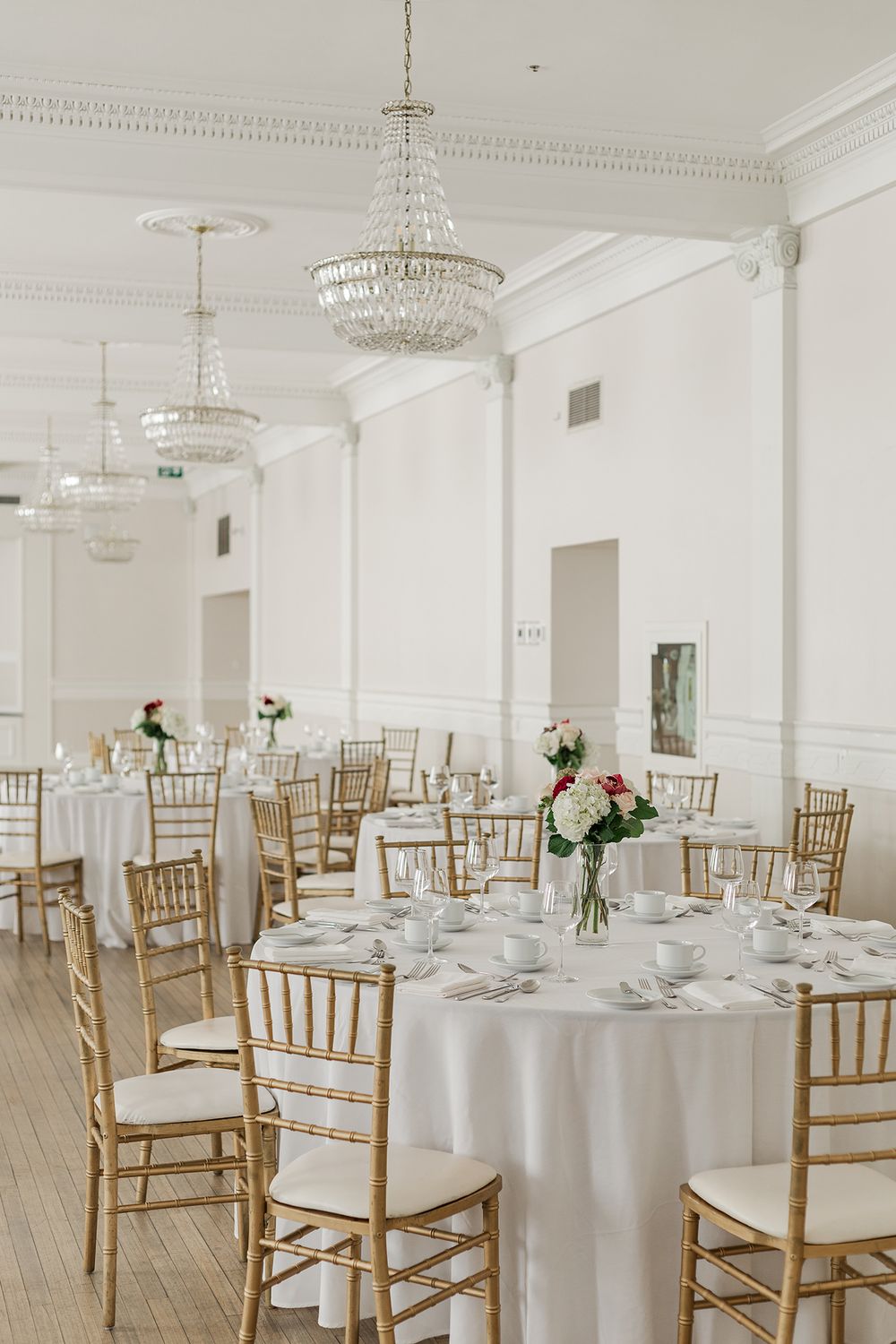 Wedding reception tables in the crystal ballroom at The Walper Hotel in Kitchener, Ontario.