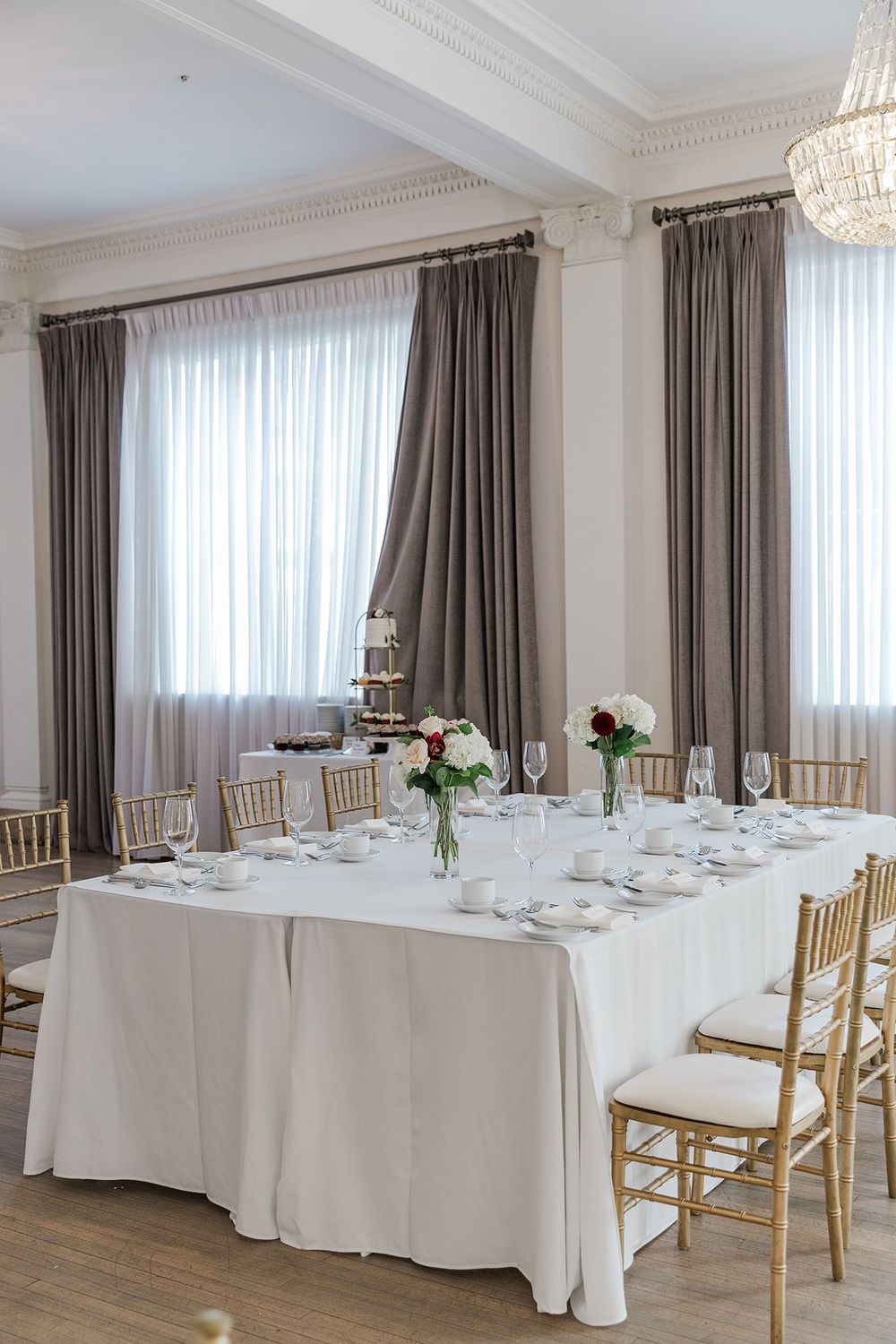 The head table for a wedding in the ballroom at The Walper Hotel in Kitchener, Ontario.
