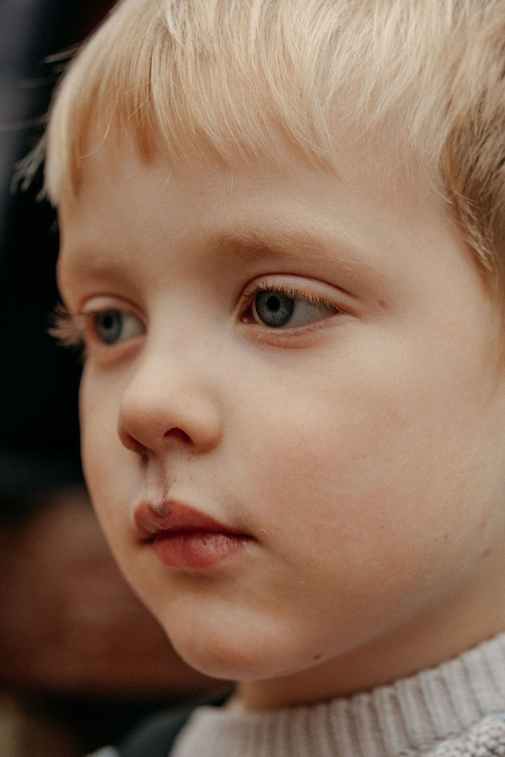 Gentle close up portrait of an Autistic boy exploring the outdoors in Shiremoor