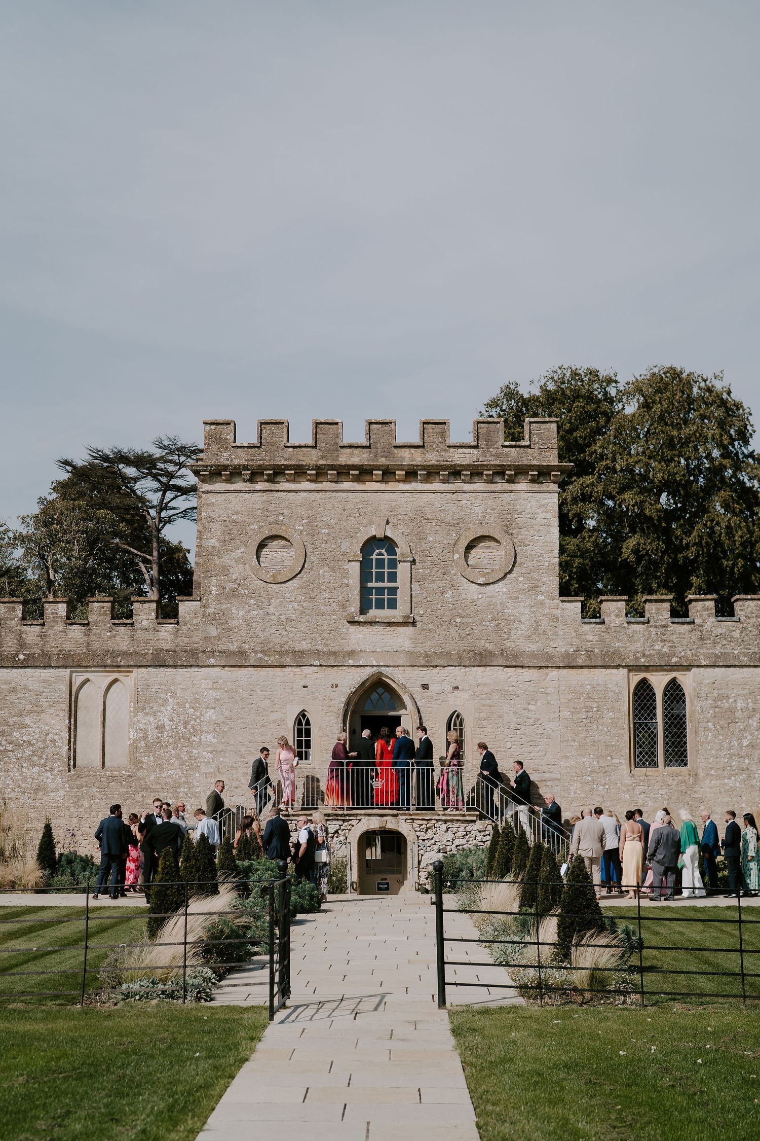 wedding guests entering ceremony at ivy lodge in cirencester