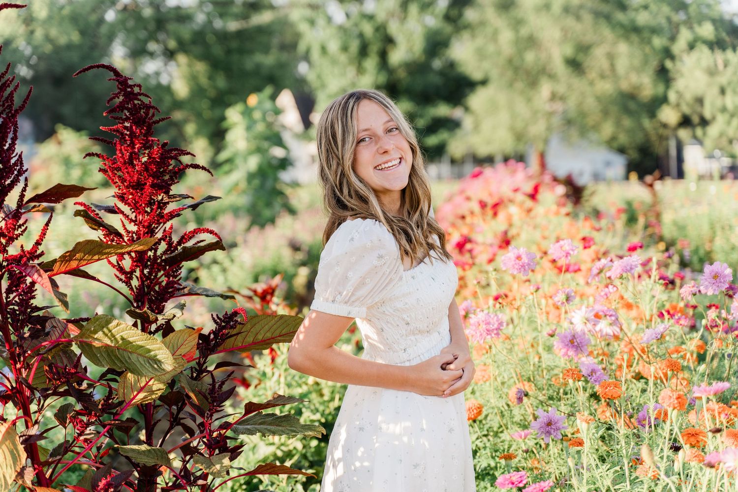 Summer senior photos at GardenView Flowers by Toledo senior photographer