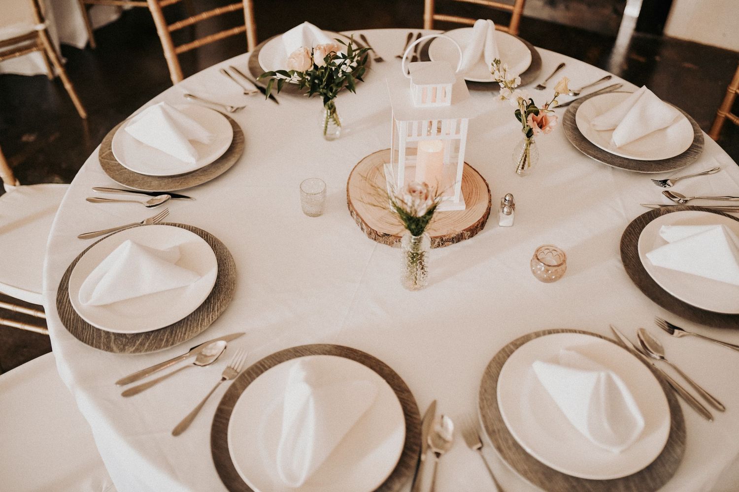 Editorial reception flat lay with romantic pink and green wedding details styled for a spring celebration.