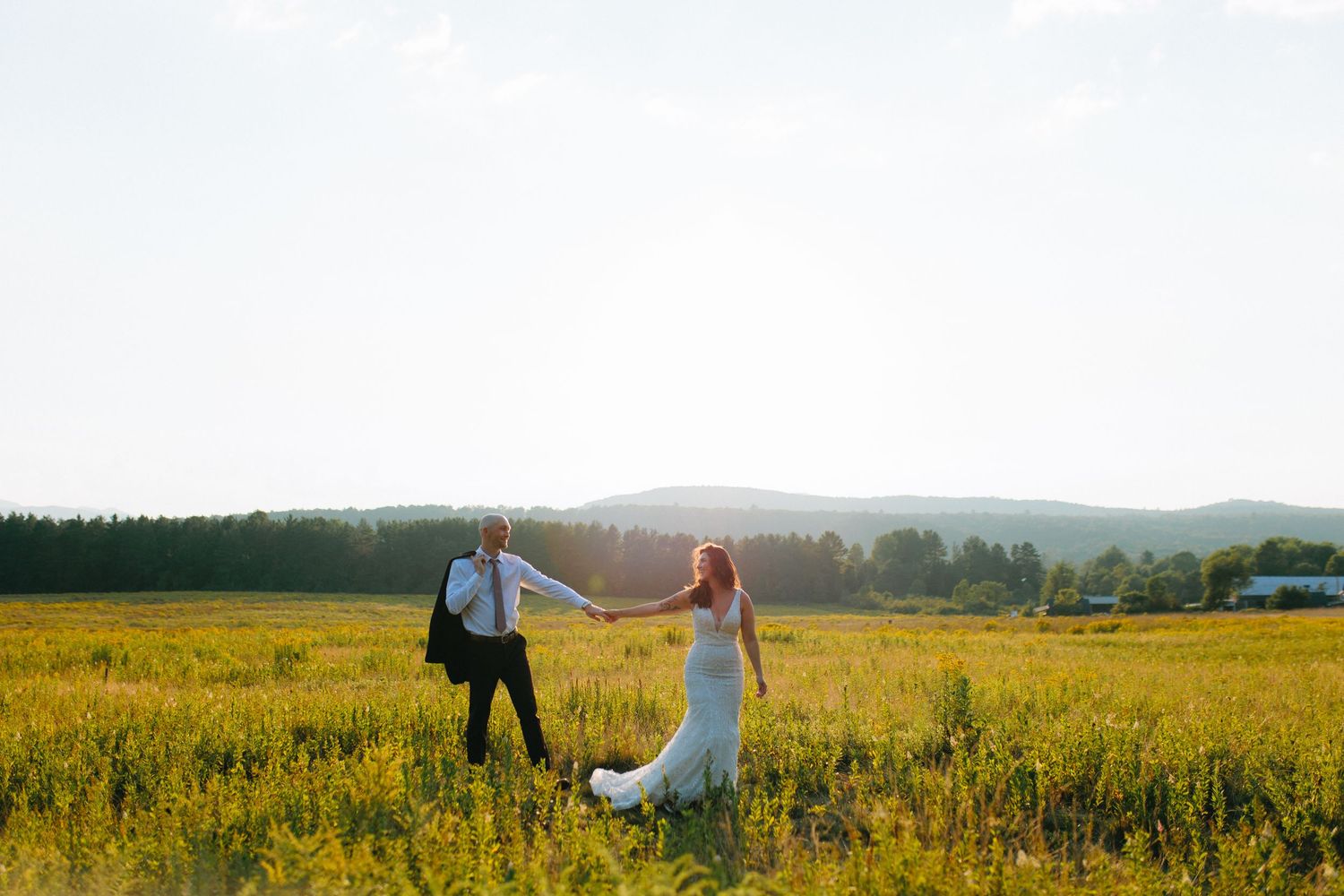 Five connected rustic landscape wedding photos showing romantic moments against golden fields and natural backdrops.