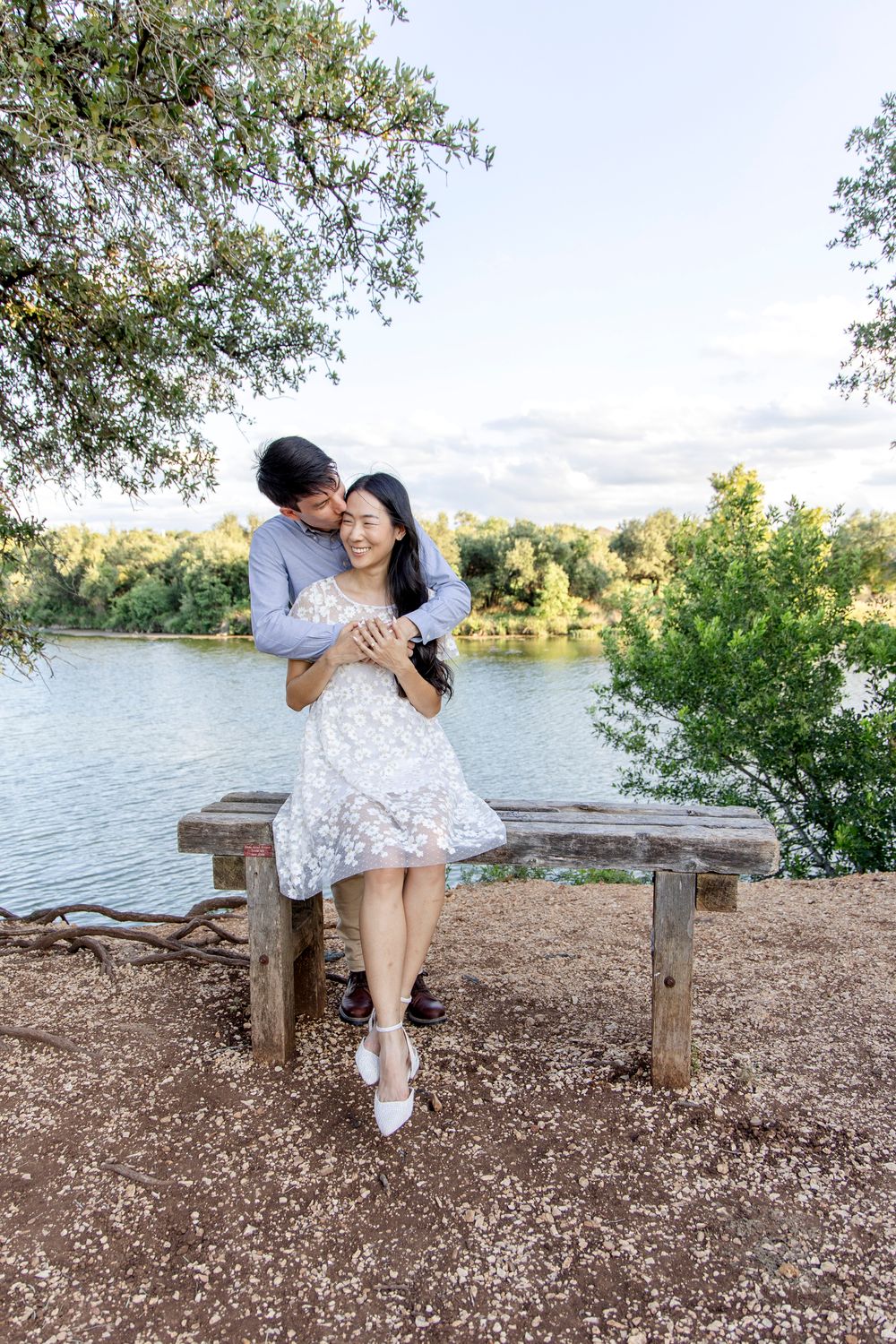 Austin engagement session with couple laughing and walking hand-in-hand