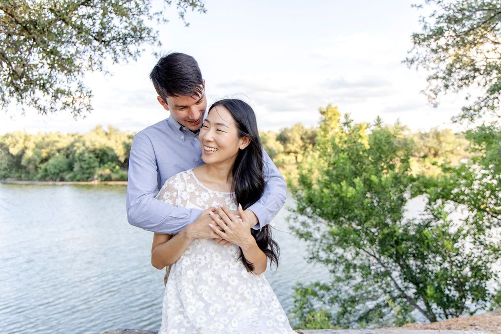 San Antonio engagement session with couple laughing and walking hand-in-hand