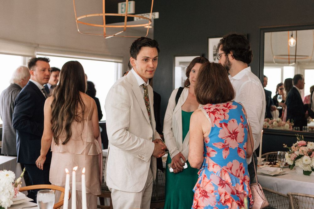 Family and friends gathered for an oceanfront Malibu wedding reception on PCH.