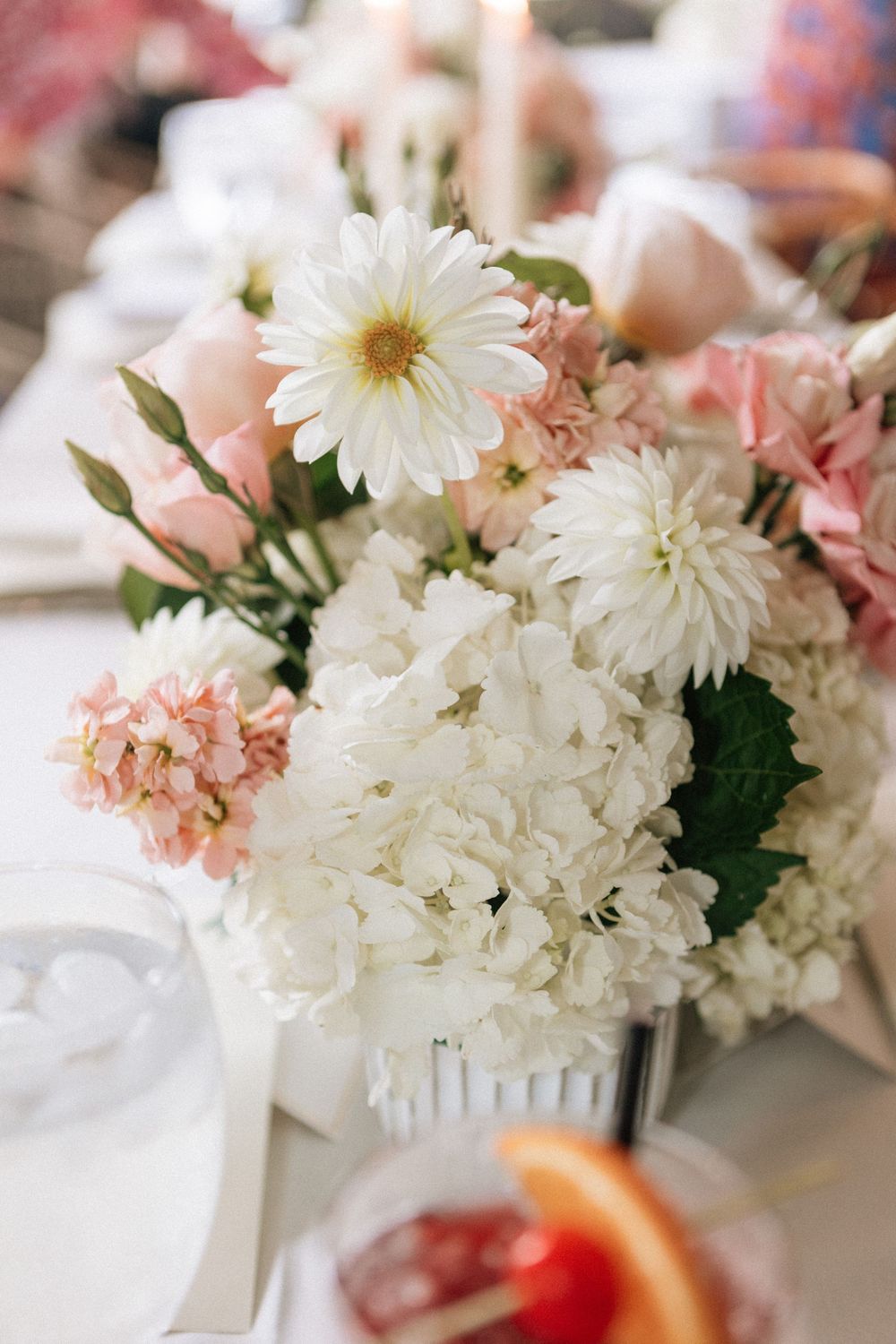 Malibu film photographer detail shot of floral arrangements for a dinner party.