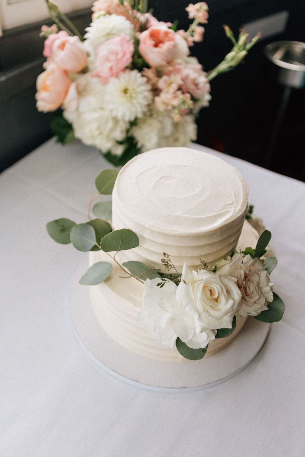 Simple and elegant wedding cake at an intimate Malibu beach wedding.
