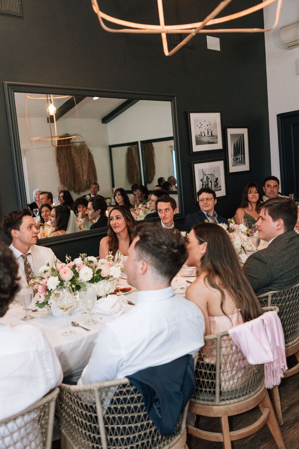 Guests enjoying a plated dinner at a beachside Malibu wedding reception at The Sunset Restaurant.