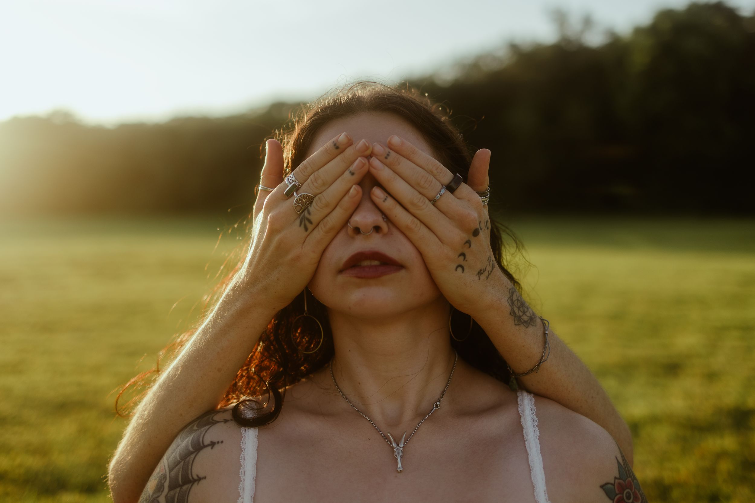 Cinematic South Florida portrait of woman covering eyes in golden light emotional editorial styled for actors and creatives by MannyPortrait