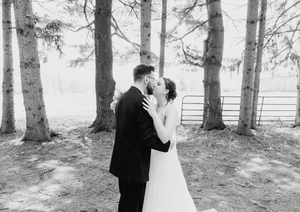 Black and white photo sequence showing a romantic moment between a couple in formal attire among trees outdoors.