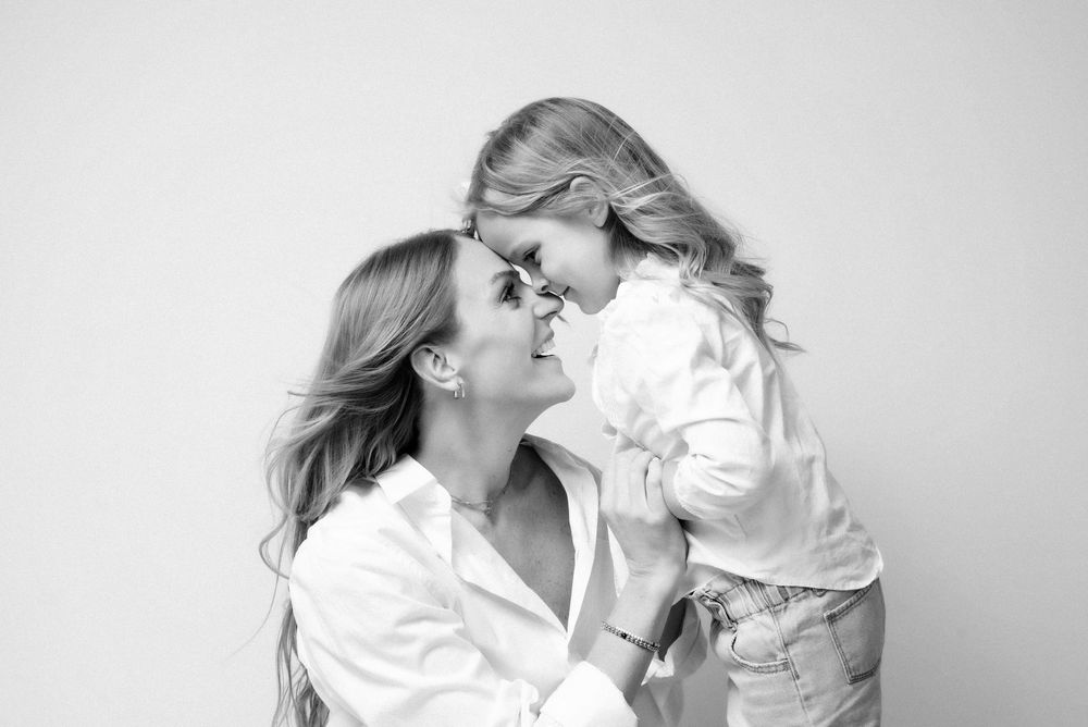 Emotional black and white portrait mother and young daughter Nashville portrait studio Thompson’s Station