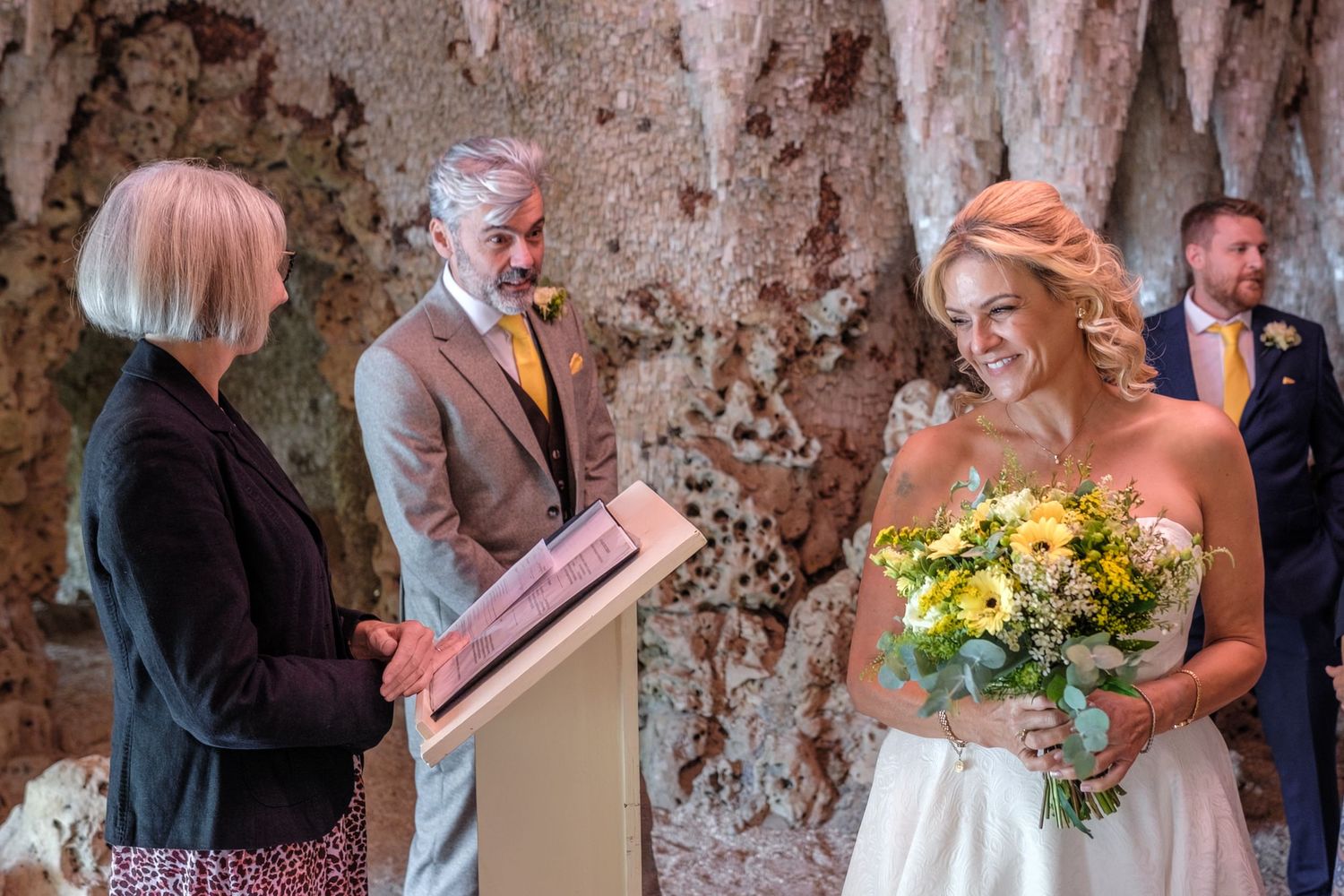 A series of wedding photographs showing candid moments between couples and guests at a celebration.