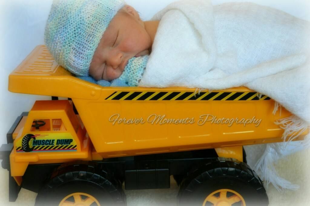 A yellow toy dump truck machine photographed at multiple angles with what appears to be rice grains spilling from its back.