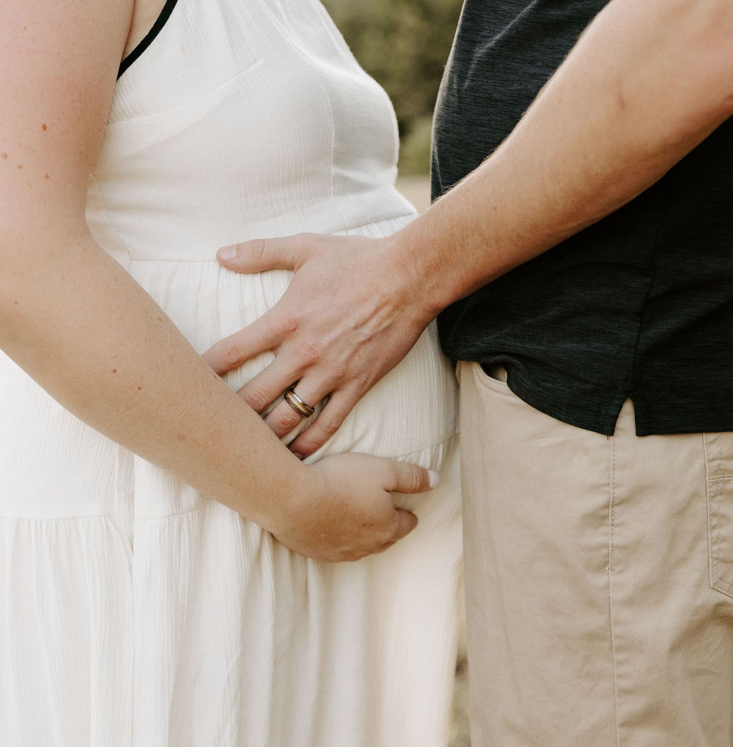 Outdoor maternity photoshoot for a couple in New Hampshire.