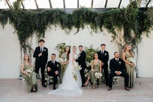 Wedding party poses together in a sequence of elegant outdoor portraits against a light neutral wall background.