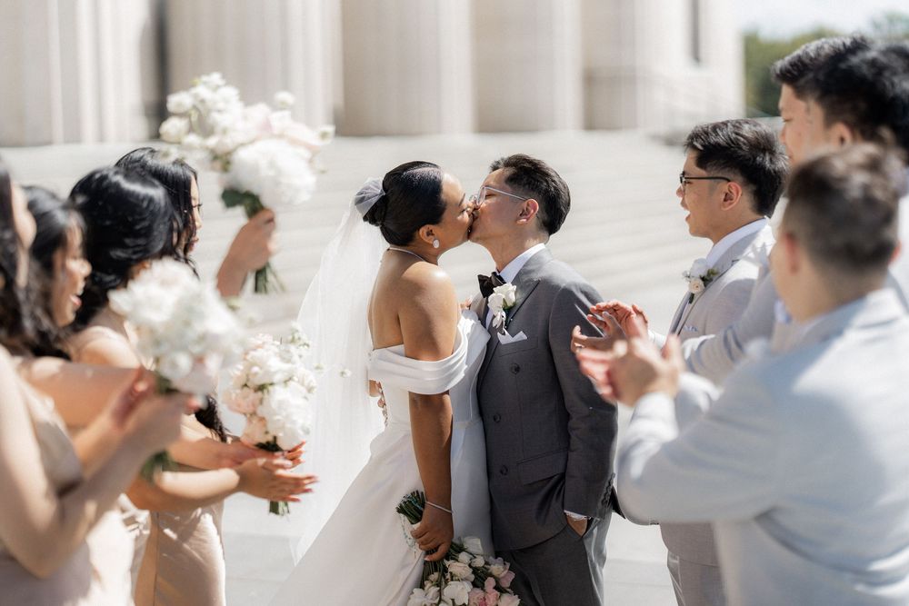 A wedding celebration sequence showing guests reacting with joy and laughter during a special moment.