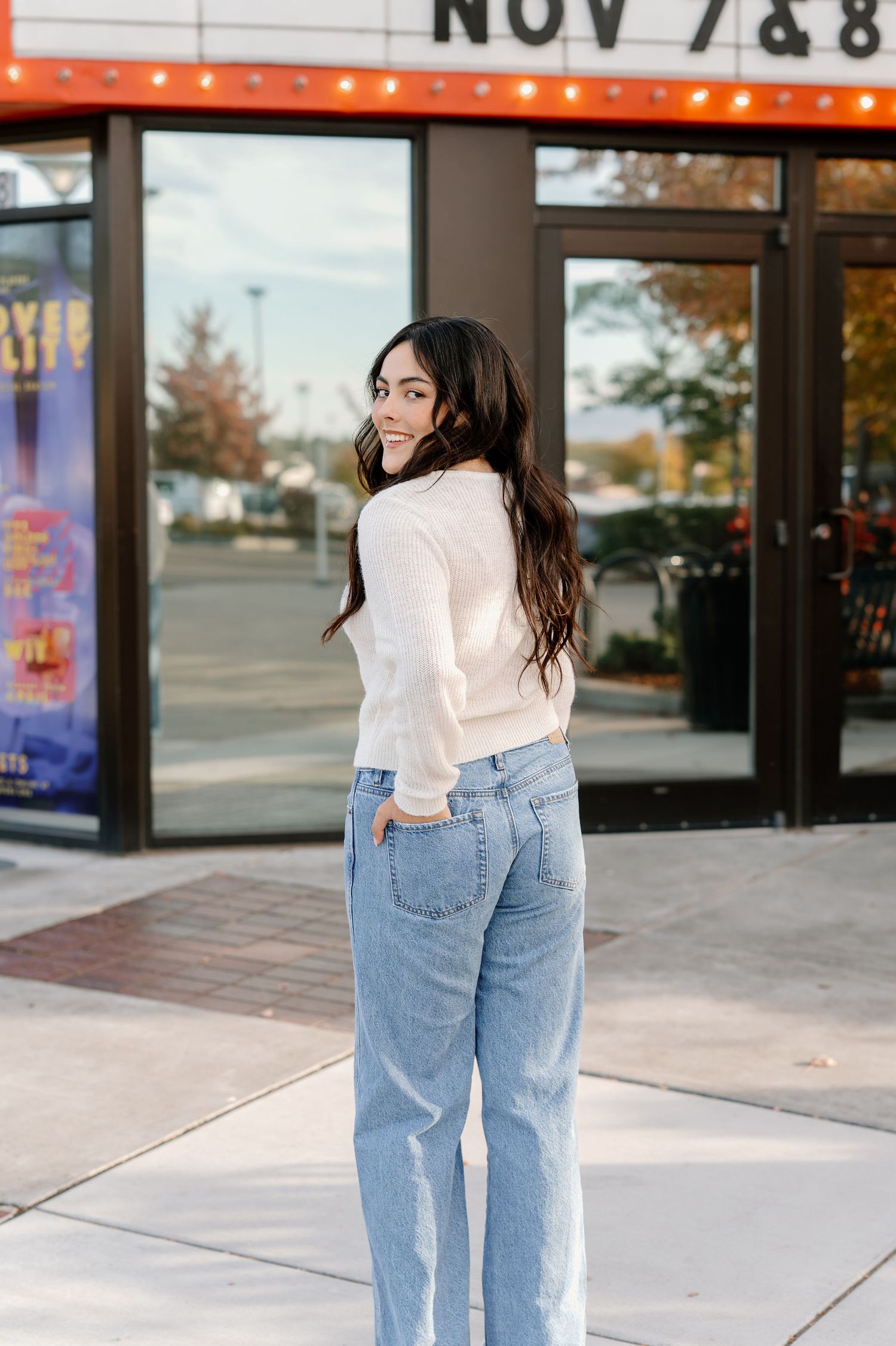 Downtown senior pictures in front of an old theater in Richland, WA
