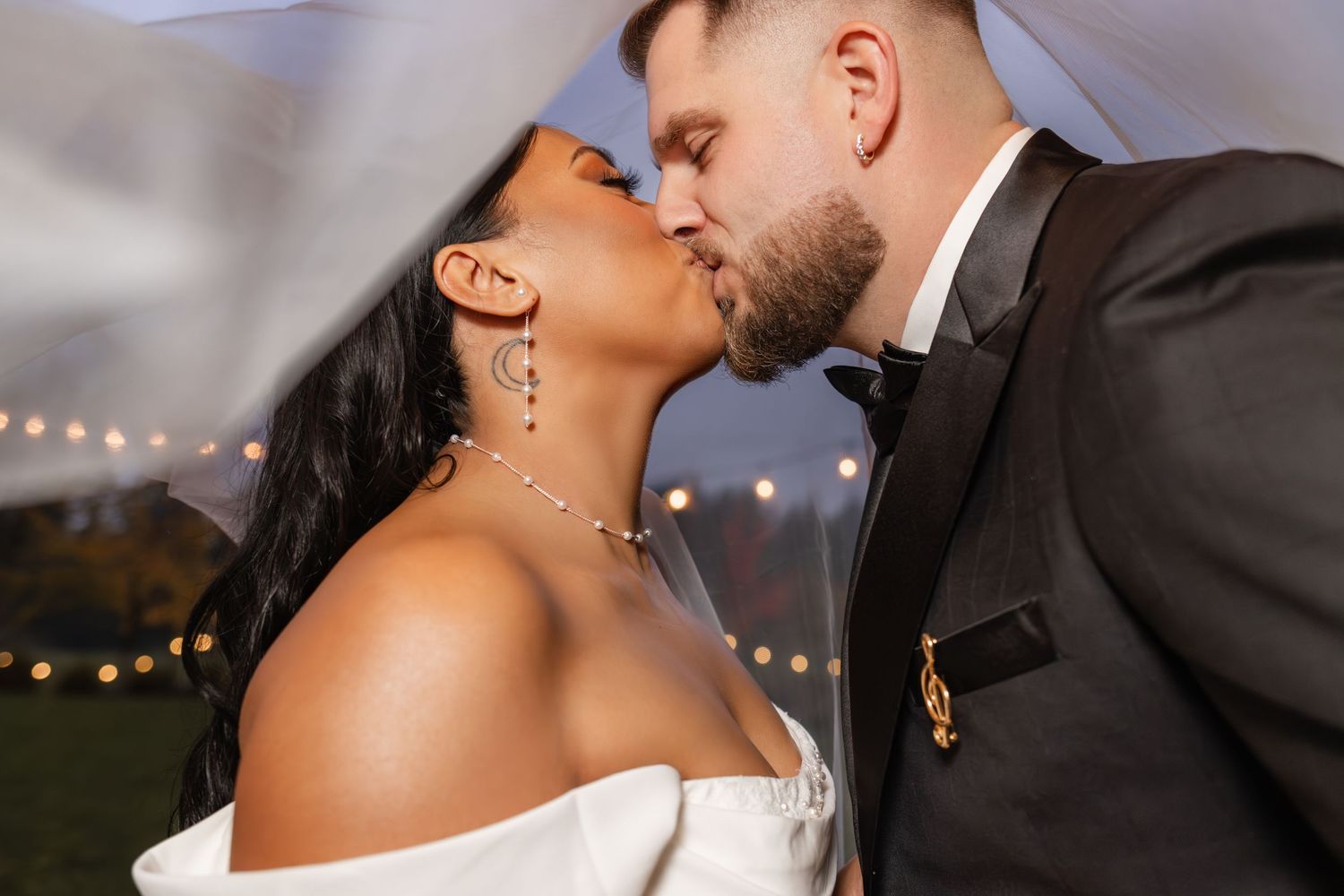 Black and white wedding photos showing couples dancing and celebrating at a formal reception.